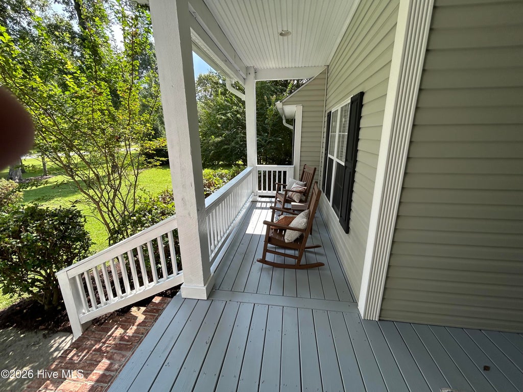 Photo of 303 Oakmont Drive, Hampstead, NC 28443 (MLS # 100601873)