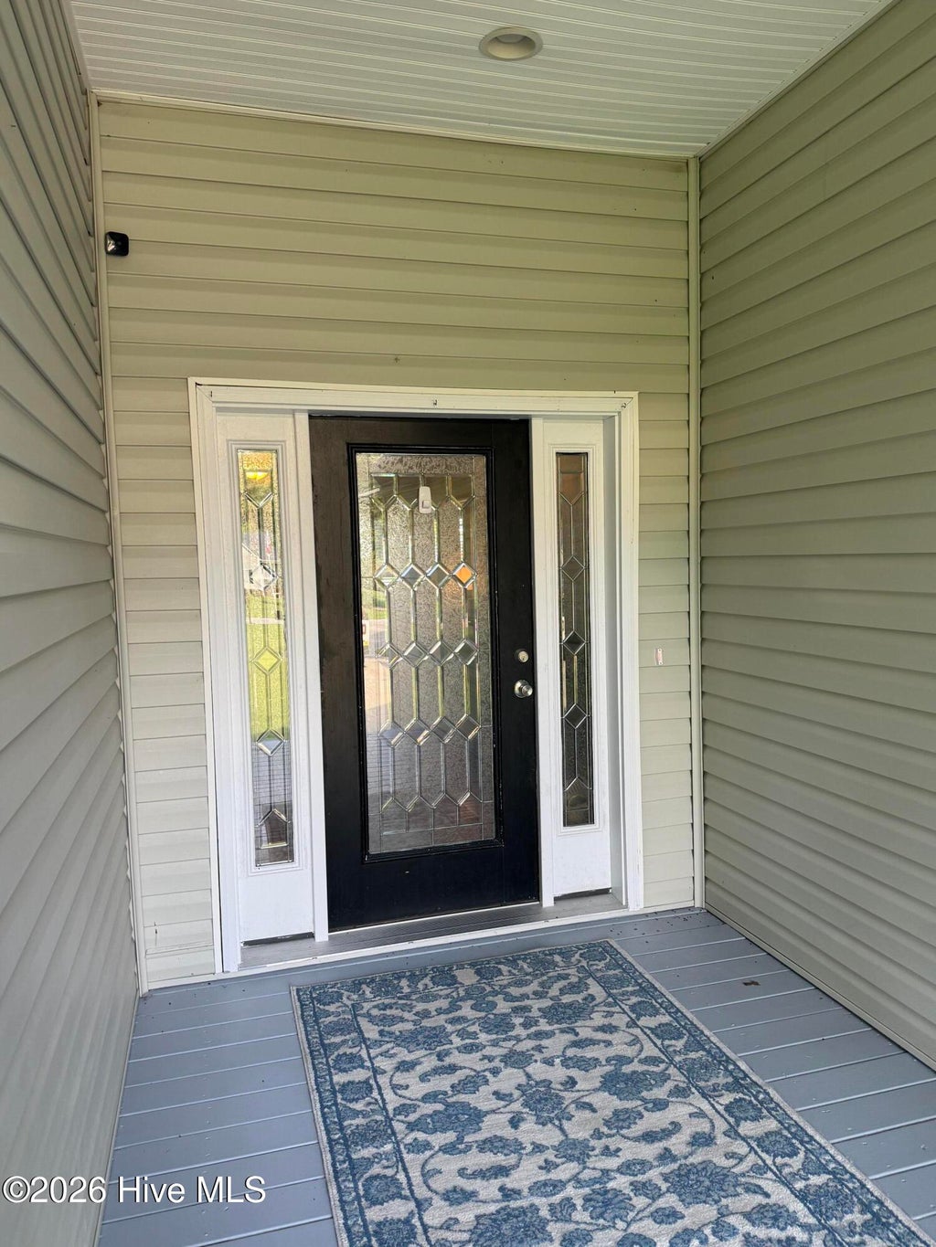 Photo of 303 Oakmont Drive, Hampstead, NC 28443 (MLS # 100601873)