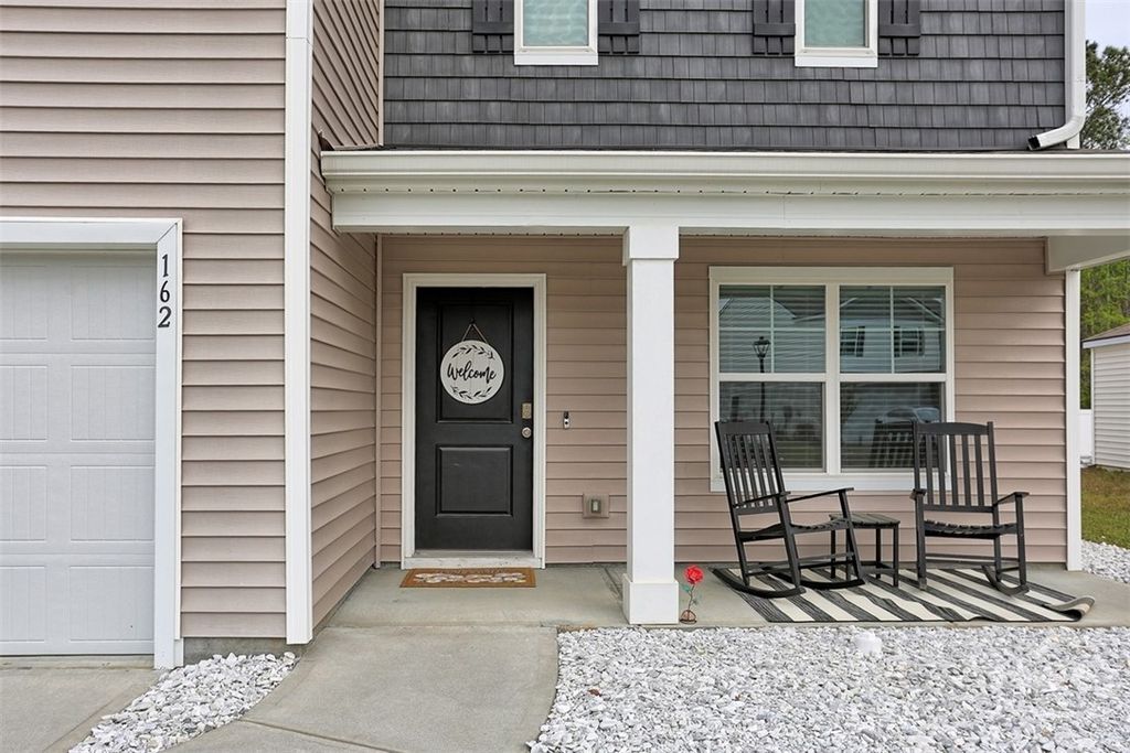 Photo of 162 Tobago Circle, Guyton, GA 31312 (MLS # SA352015)