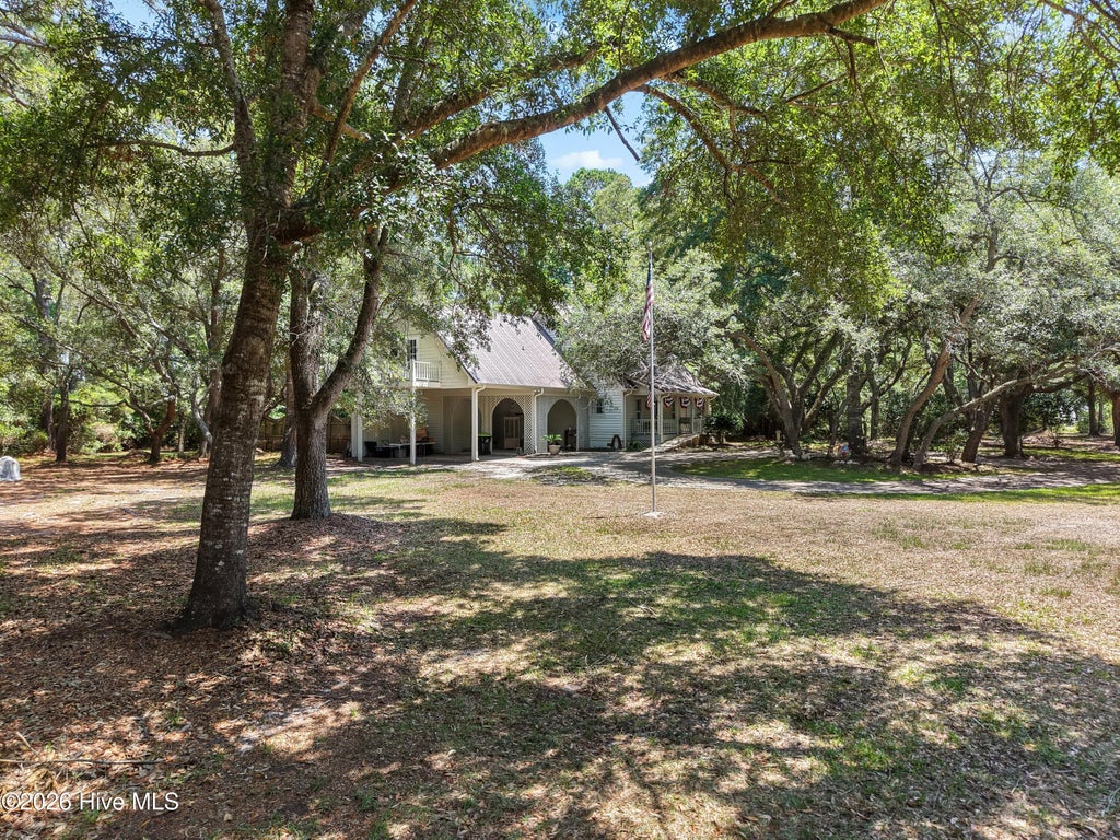 Photo of 299 Riverside Drive SW, Varnamtown, NC 28462 (MLS # 100586355)