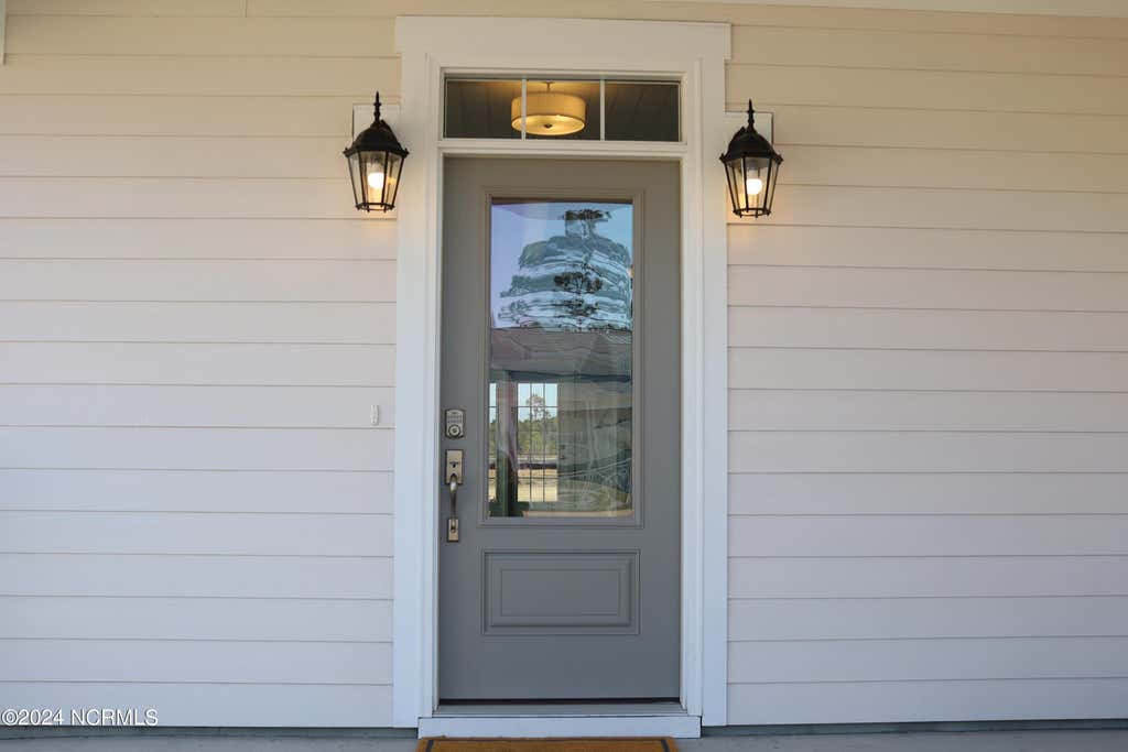 Photo of 21 E Singing Avenue, Hampstead, NC 28443 (MLS # 100588567)