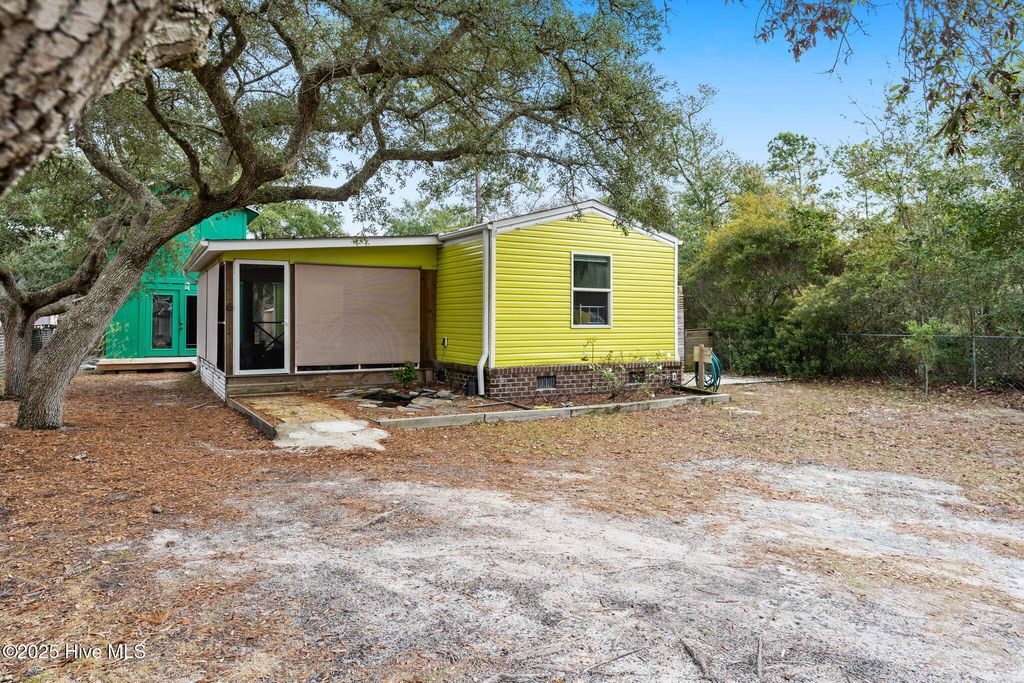 Photo of 118 NE 67th Street, Oak Island, NC 28465 (MLS # 100544596)