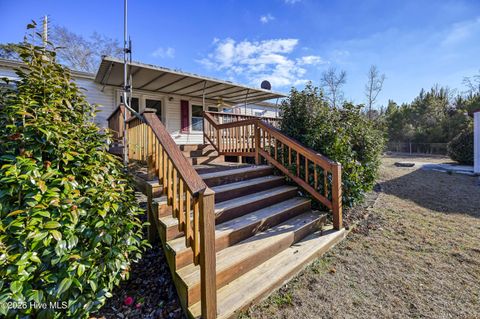 Tiny photo for 876 Mcclammy Road, Hampstead, NC 28443 (MLS # 100557580)