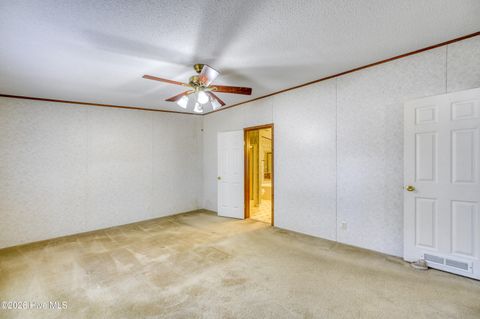 Tiny photo for 876 Mcclammy Road, Hampstead, NC 28443 (MLS # 100557580)