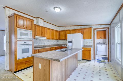 Tiny photo for 876 Mcclammy Road, Hampstead, NC 28443 (MLS # 100557580)