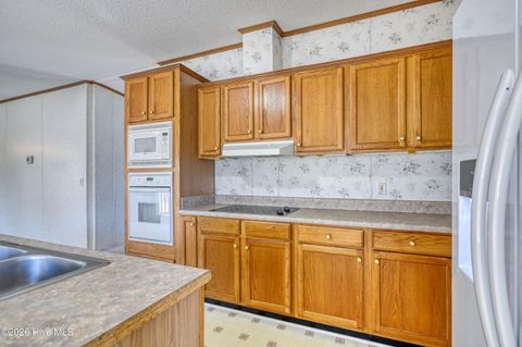 Tiny photo for 876 Mcclammy Road, Hampstead, NC 28443 (MLS # 100557580)