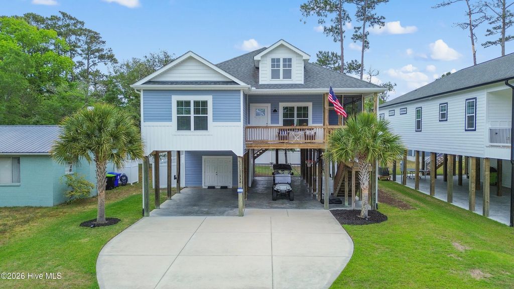 Photo of 334 NE 49th Street, Oak Island, NC 28465 (MLS # 100571827)