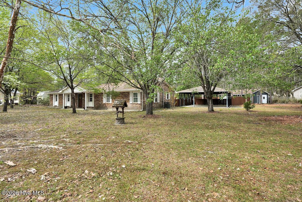 Photo of 2176 W Lake Keziah Drive, Southport, NC 28461 (MLS # 100565708)