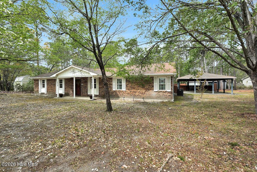 Photo of 2176 W Lake Keziah Drive, Southport, NC 28461 (MLS # 100565708)