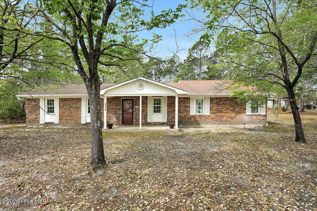 Photo of 2176 W Lake Keziah Drive, Southport, NC 28461 (MLS # 100565708)