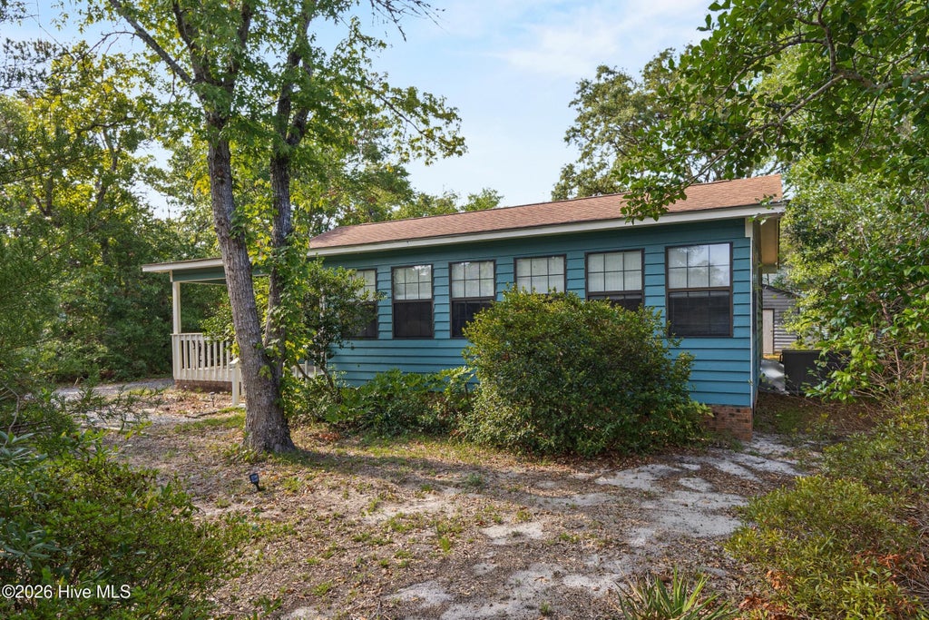 Photo of 603 E Oak Island Drive, Oak Island, NC 28465 (MLS # 100593388)
