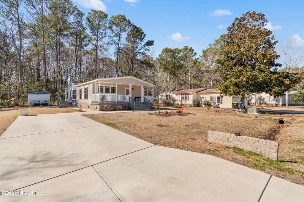 Photo of 944 Palmer Drive, Carolina Shores, NC 28467 (MLS # 100554917)