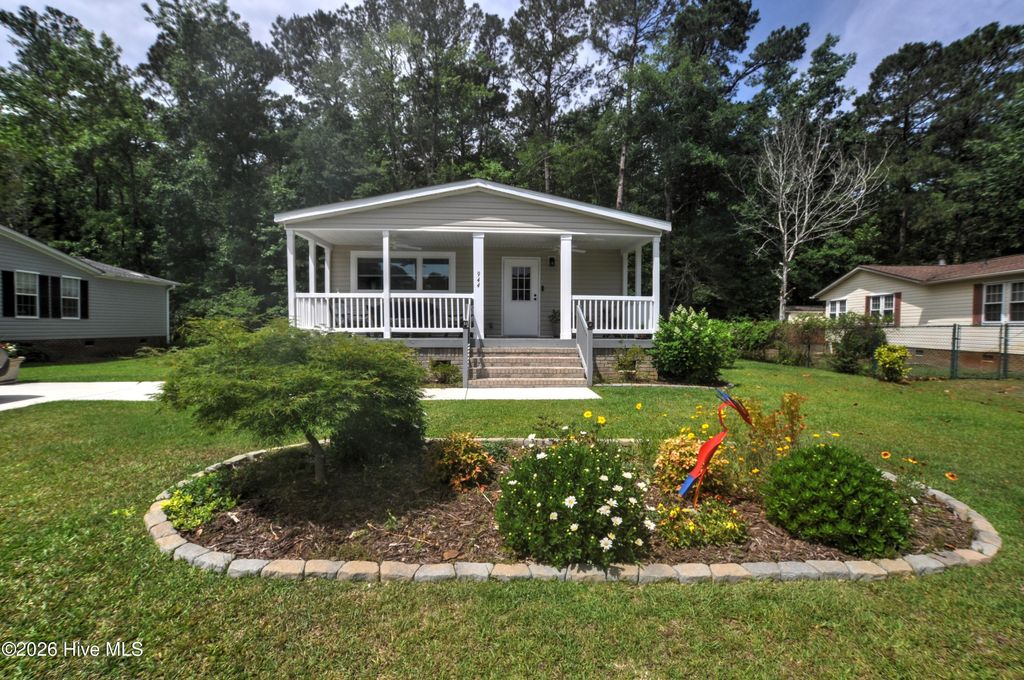 Photo of 944 Palmer Drive, Carolina Shores, NC 28467 (MLS # 100554917)