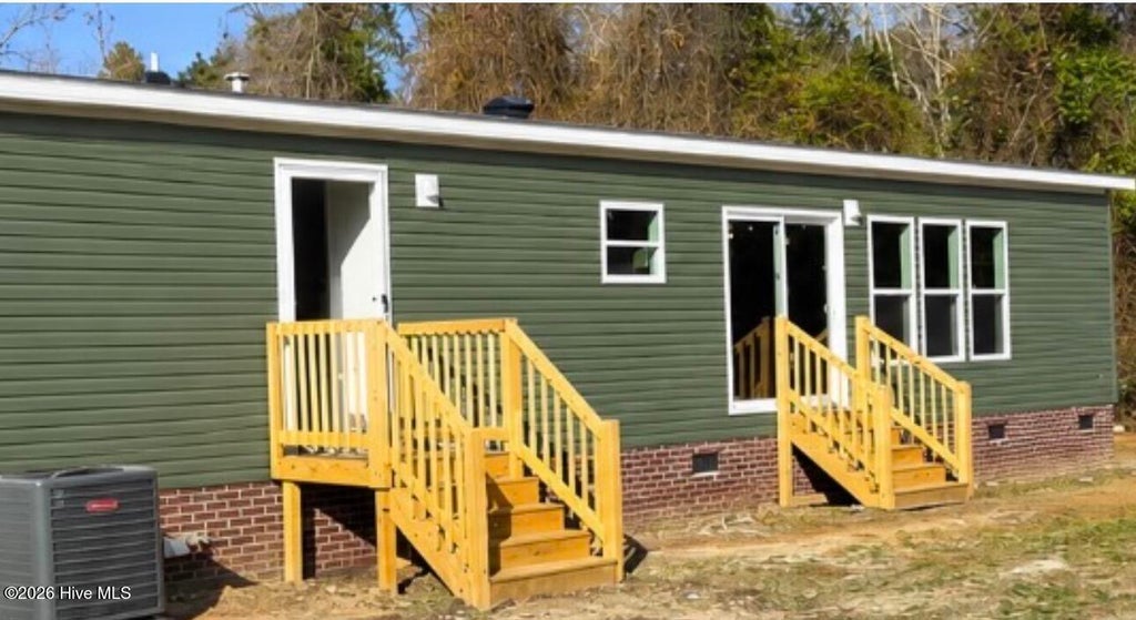 Photo of 690 Furnie Hinson Road, Whiteville, NC 28472 (MLS # 100587031)