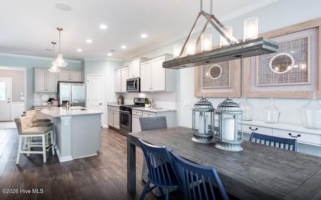 Photo of 562 Glitter Bay Loop, Shallotte, NC 28470 (MLS # 100572673)