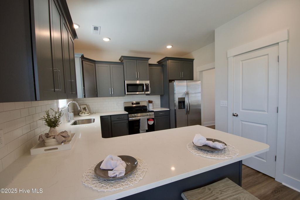 Photo of 1012 Setting Sun Boulevard NE, Winnabow, NC 28479 (MLS # 100512058)