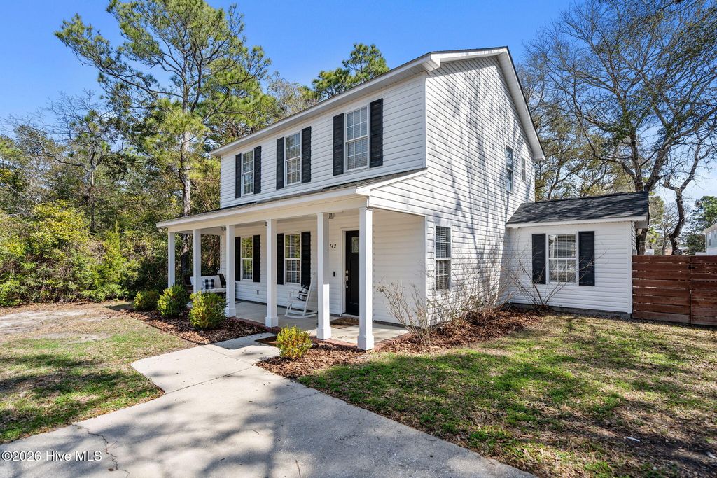 Photo of 142 NE 14th Street, Oak Island, NC 28465 (MLS # 100558103)