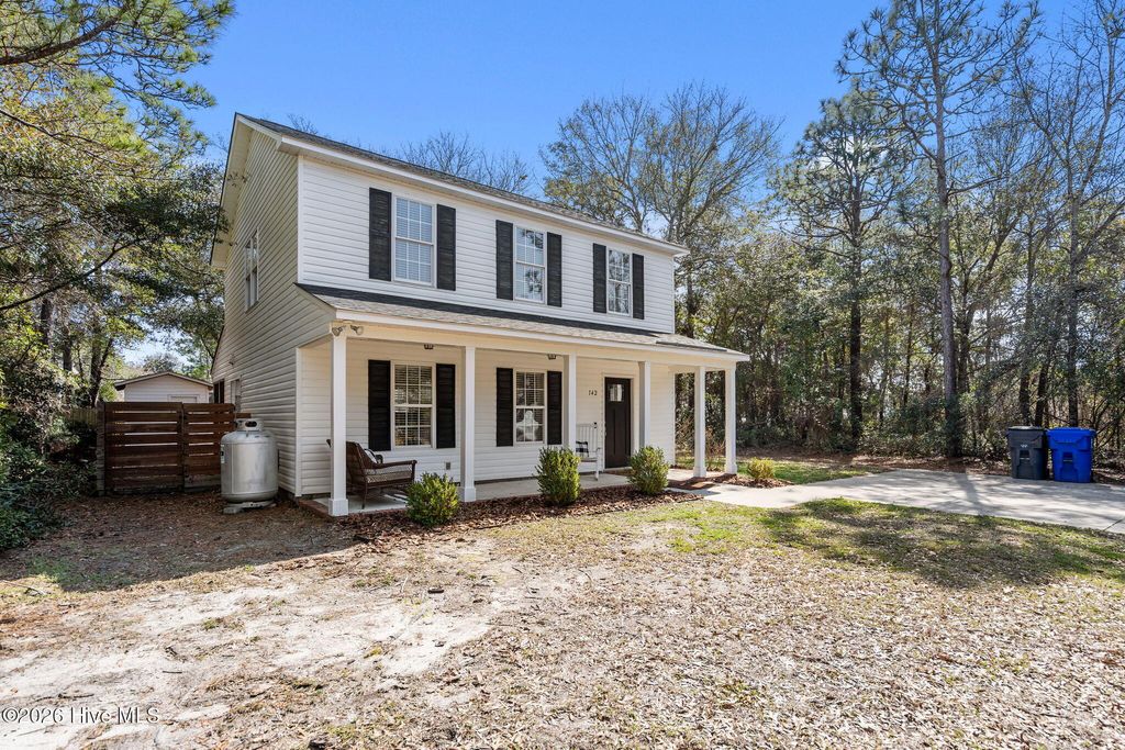 Photo of 142 NE 14th Street, Oak Island, NC 28465 (MLS # 100558103)