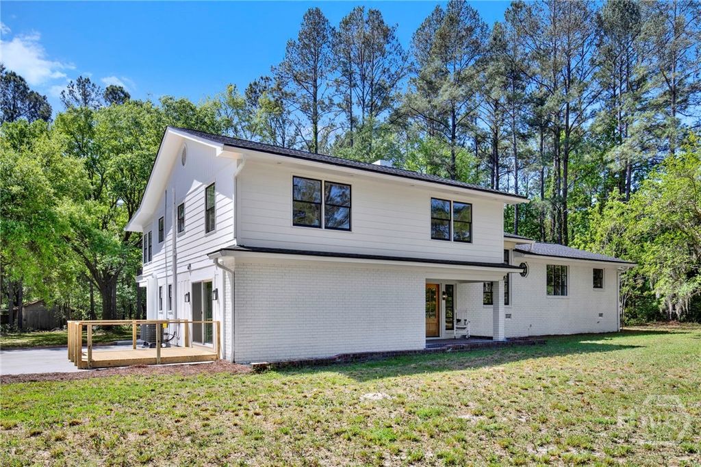 Photo of 305 Kolic Helmey Rd Rd, Guyton, GA 31312 (MLS # SA353332)