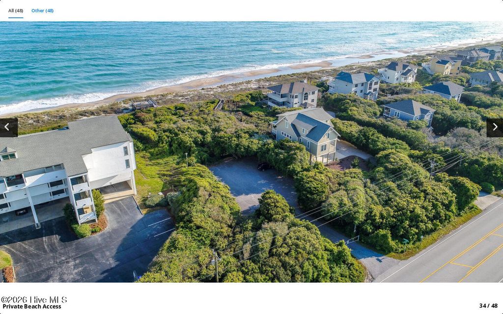 Photo of 142 Lagoon Lane, Pine Knoll Shores, NC 28512 (MLS # 100571550)