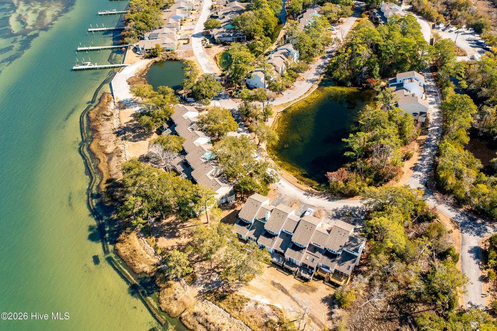 Photo of 142 Lagoon Lane, Pine Knoll Shores, NC 28512 (MLS # 100571550)