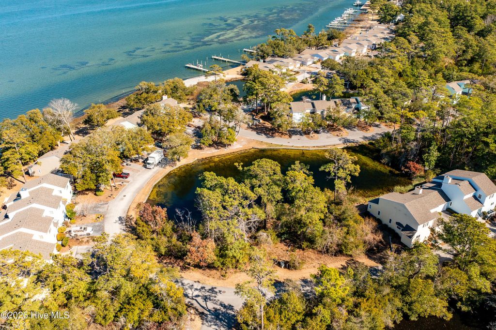 Photo of 142 Lagoon Lane, Pine Knoll Shores, NC 28512 (MLS # 100571550)