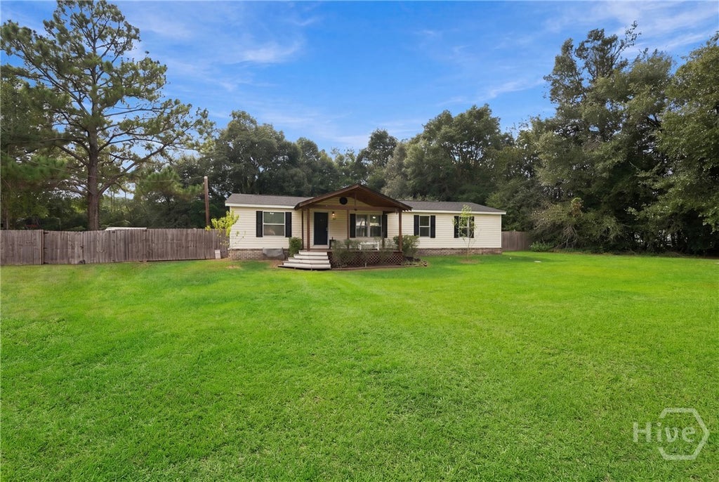 Photo of 415 Shellie Helmey Road, Guyton, GA 31312 (MLS # SA366103)