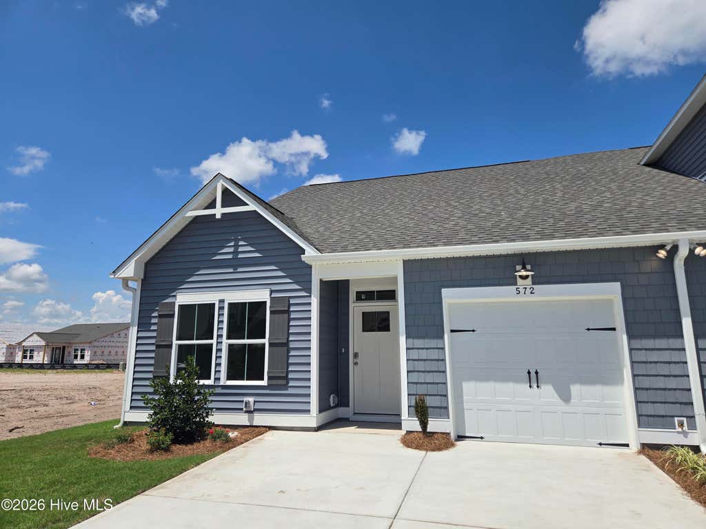Photo of 581 Pelican Cove Way SE #257, Southport, NC 28461 (MLS # 100597355)