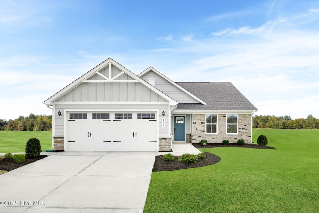 Photo of 4073 Farmfield Drive, Navassa, NC 28451 (MLS # 100527960)