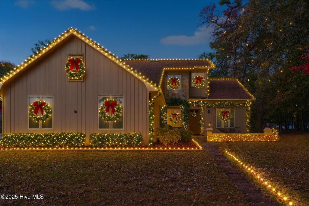 Photo of 1618 Woodland Court SW, Ocean Isle Beach, NC 28469 (MLS # 100542337)