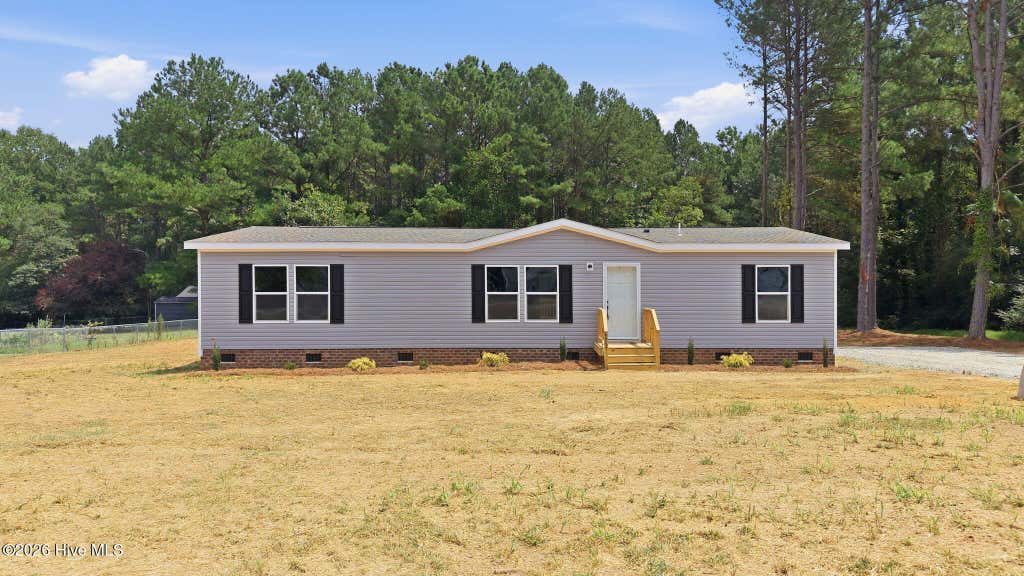Photo of 9757 Fire Tower Farm Road, Whitakers, NC 27891 (MLS # 100597987)