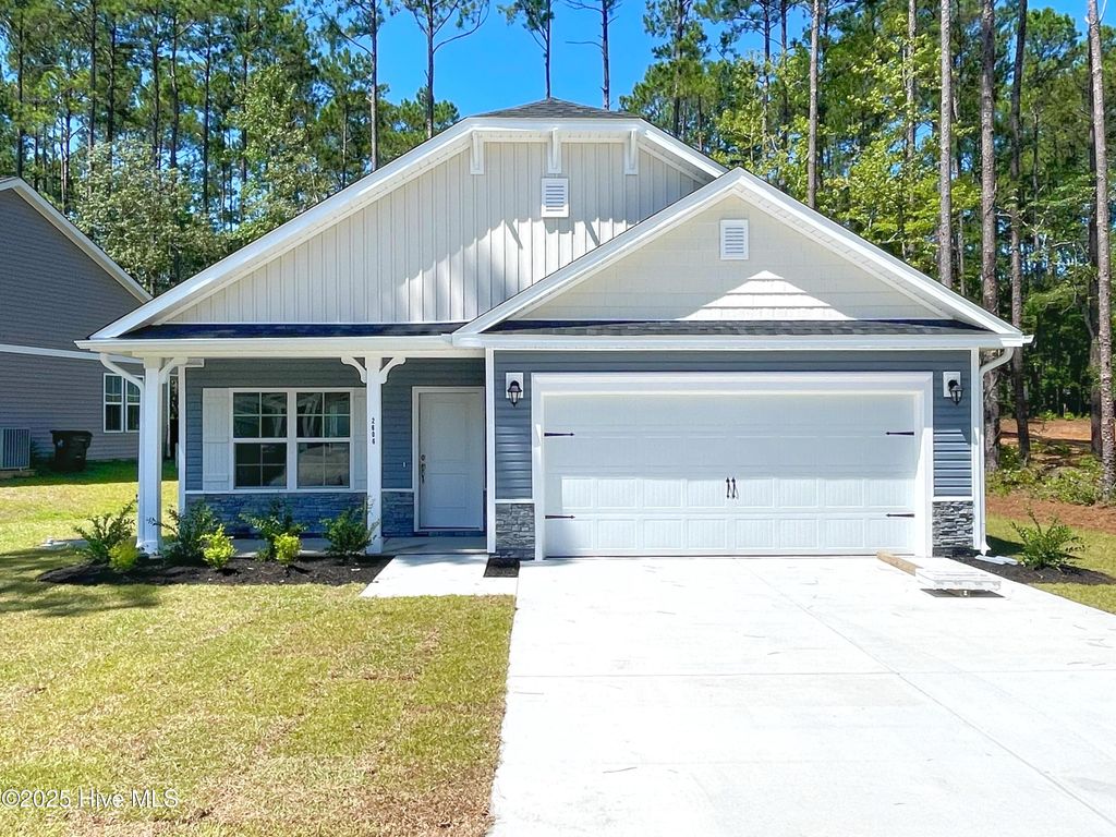 Photo of 2606 Provence Drive SE, Bolivia, NC 28422 (MLS # 100522611)