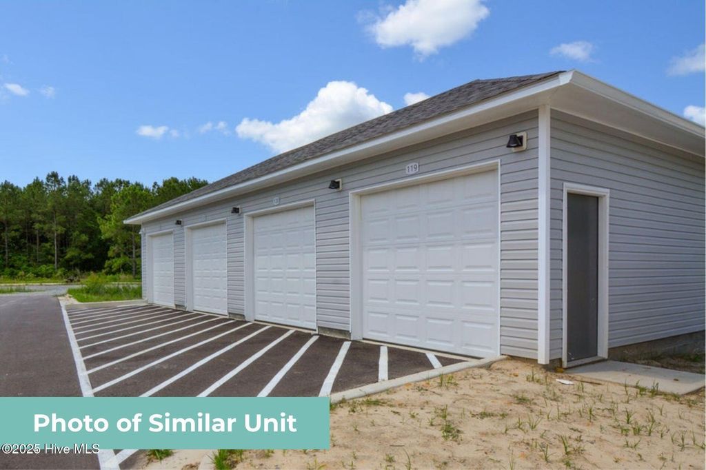 Photo of 217 Sandy Cove Lane, Sneads Ferry, NC 28460 (MLS # 100552369)