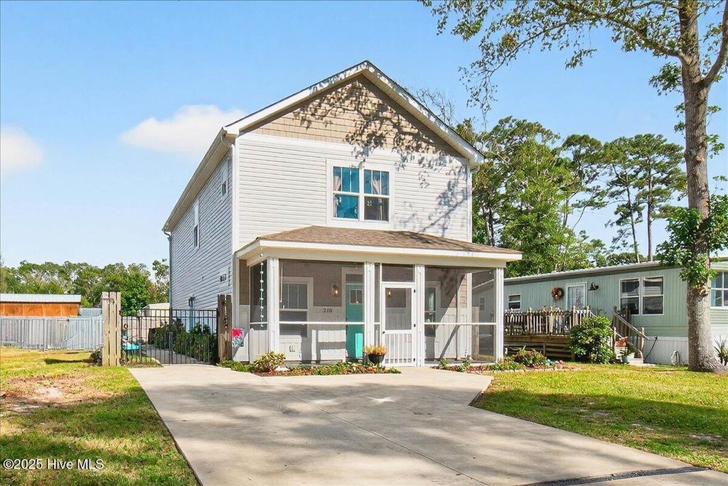 Photo of 218 NE 76th Street, Oak Island, NC 28465 (MLS # 100531738)