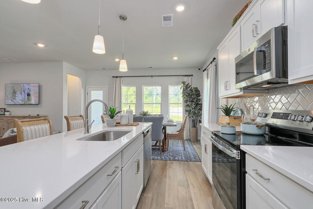 Photo of 700 Mallory Drive, Sneads Ferry, NC 28460 (MLS # 100577908)