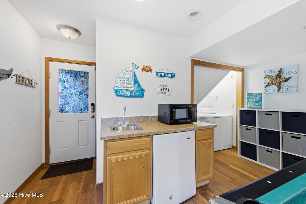 Photo of 767 Gulfstream Court, Corolla, NC 27927 (MLS # 100560072)