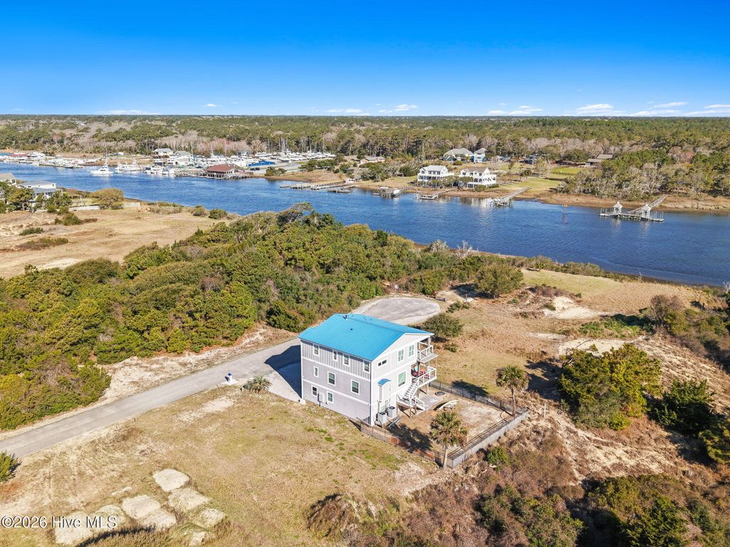 Photo of 128 Blockade Runner Drive, Holden Beach, NC 28462 (MLS # 100561673)