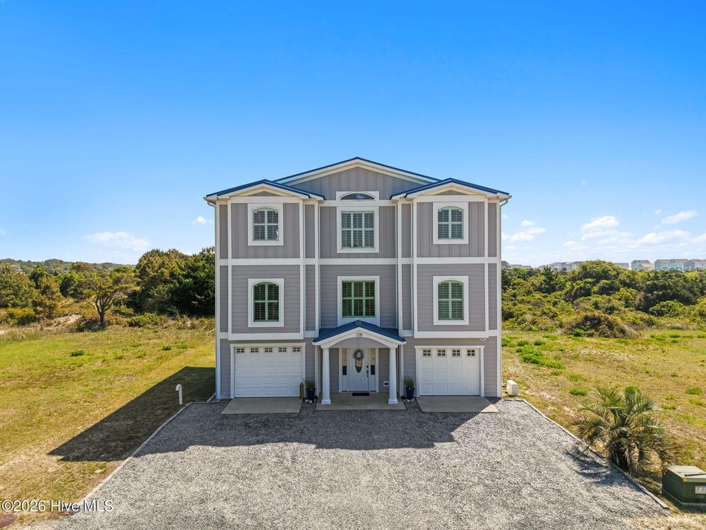Photo of 128 Blockade Runner Drive, Holden Beach, NC 28462 (MLS # 100561673)