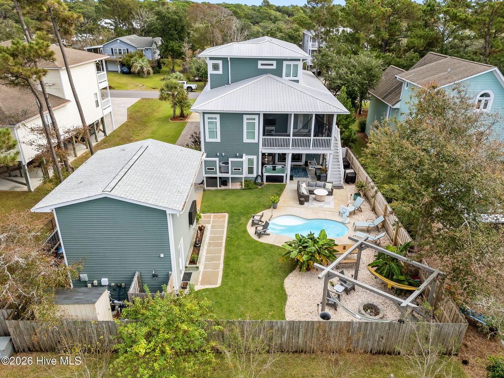 Photo of 303 Mcglamery Street, Oak Island, NC 28465 (MLS # 100557179)