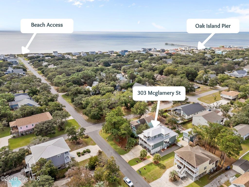 Photo of 303 Mcglamery Street, Oak Island, NC 28465 (MLS # 100557179)
