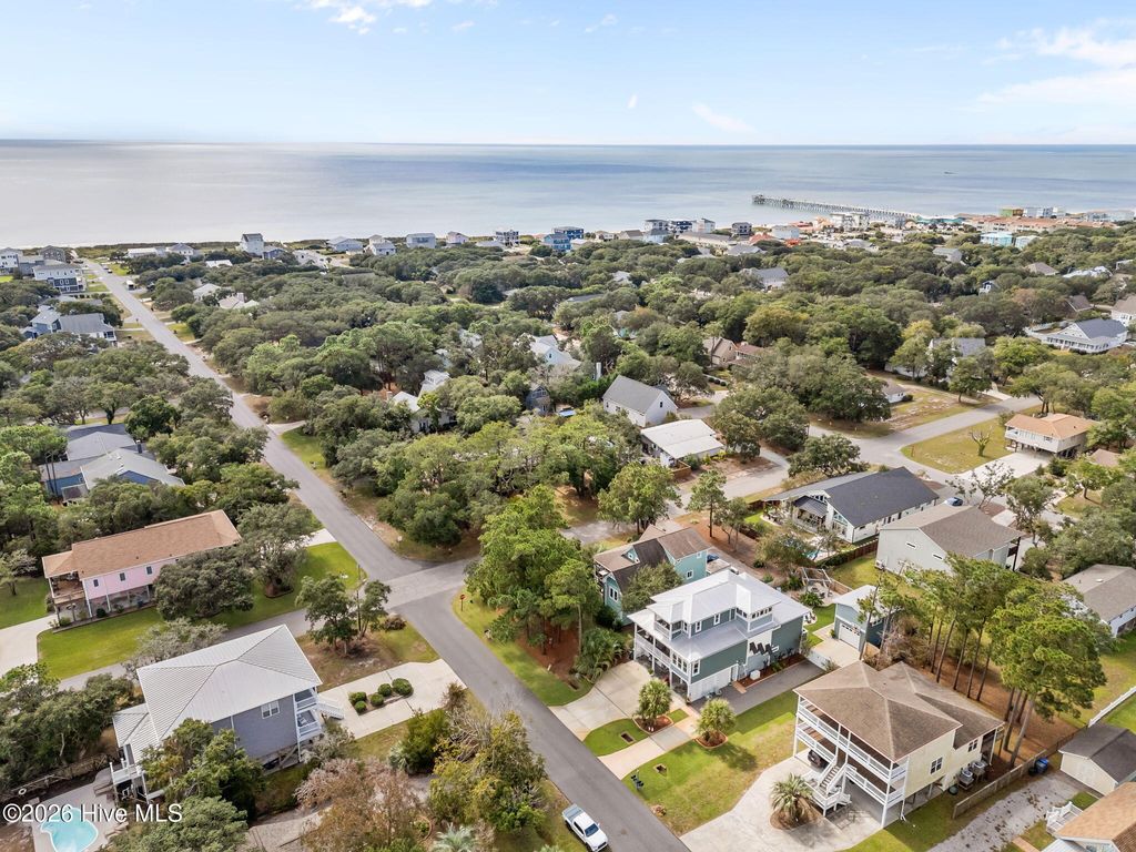 Photo of 303 Mcglamery Street, Oak Island, NC 28465 (MLS # 100557179)