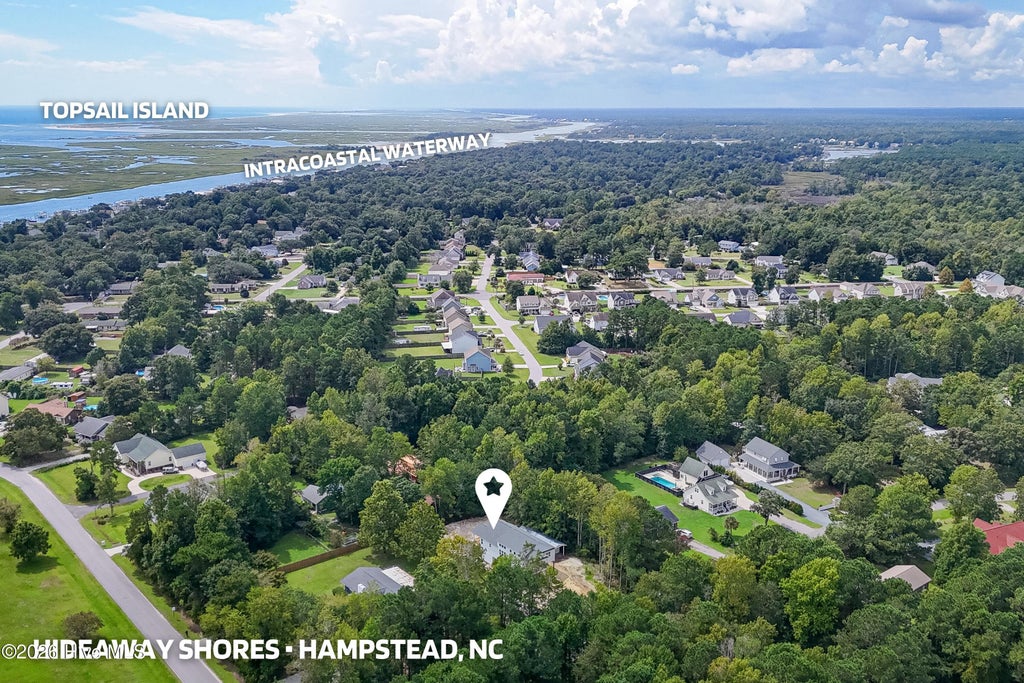Photo of 203 Sand Dollar Lane, Hampstead, NC 28443 (MLS # 100605287)