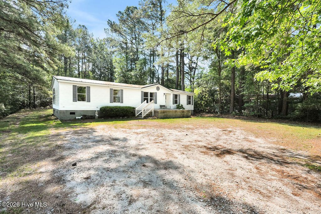 Photo of 1540 Bluff Drive NE, Leland, NC 28451 (MLS # 100569938)