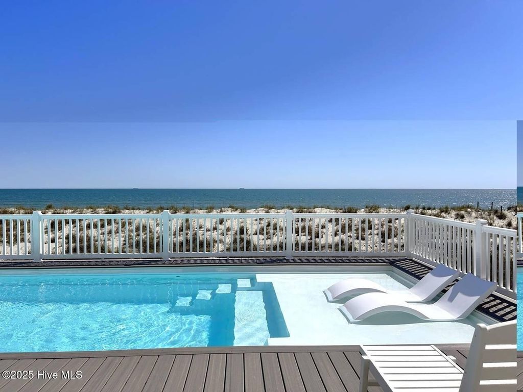 Photo of 3527 E Beach Drive, Oak Island, NC 28465 (MLS # 100484000)