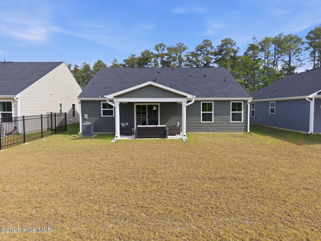 Photo of 1123 Middle Crest Drive NE, Bolivia, NC 28422 (MLS # 100569541)
