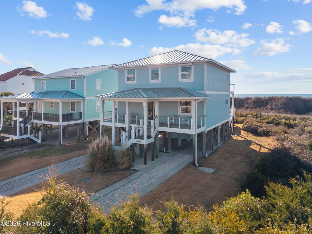 Photo of 7403 E Beach Drive, Oak Island, NC 28465 (MLS # 100552258)