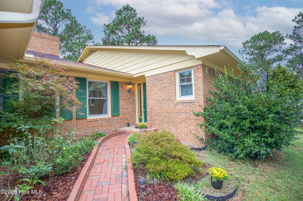Photo of 119 Pine Lake Drive, Whispering Pines, NC 28327 (MLS # 100606105)