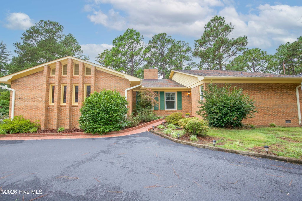 Photo of 119 Pine Lake Drive, Whispering Pines, NC 28327 (MLS # 100606105)