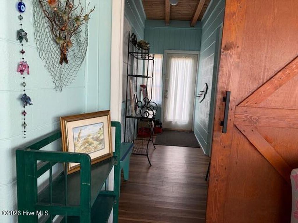 Photo of 313 Mercer Street, Oak Island, NC 28465 (MLS # 100563343)