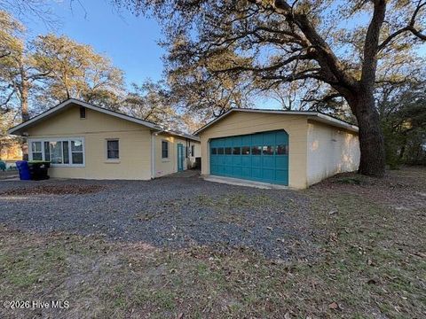 Tiny photo for 313 Mercer Street, Oak Island, NC 28465 (MLS # 100563343)